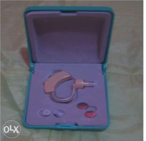 Behind the ear wireless hearing aid
